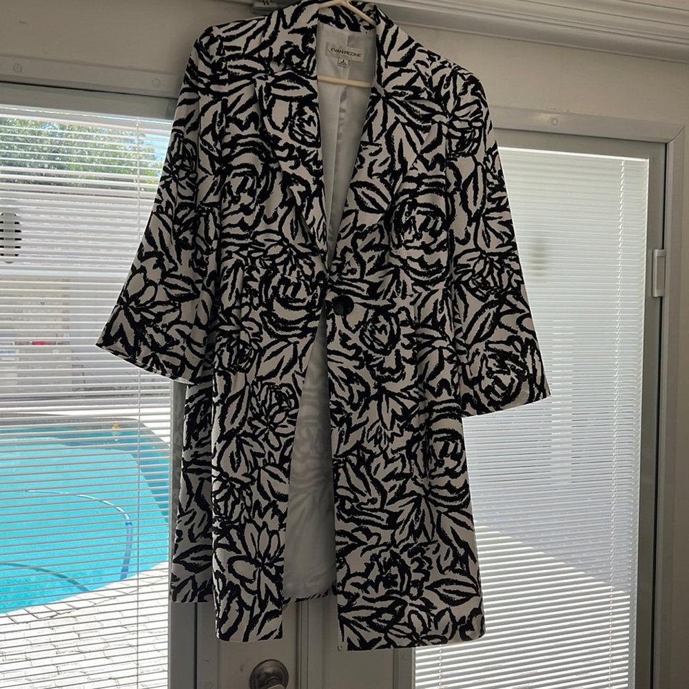 Black and white swirl knee length jacket